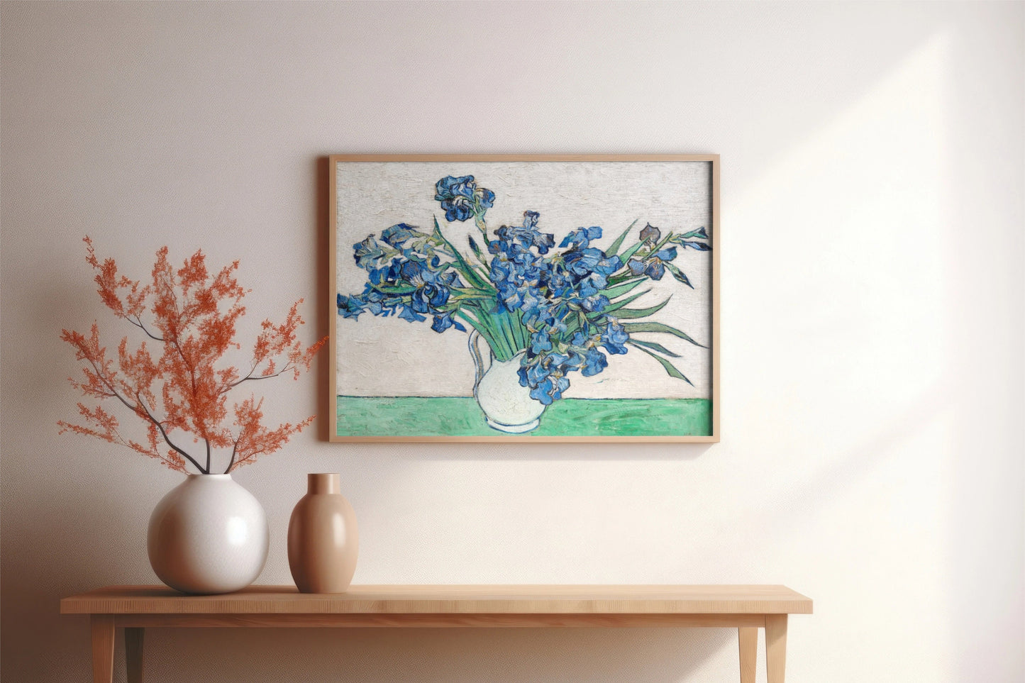 a painting of blue flowers in a vase on a table