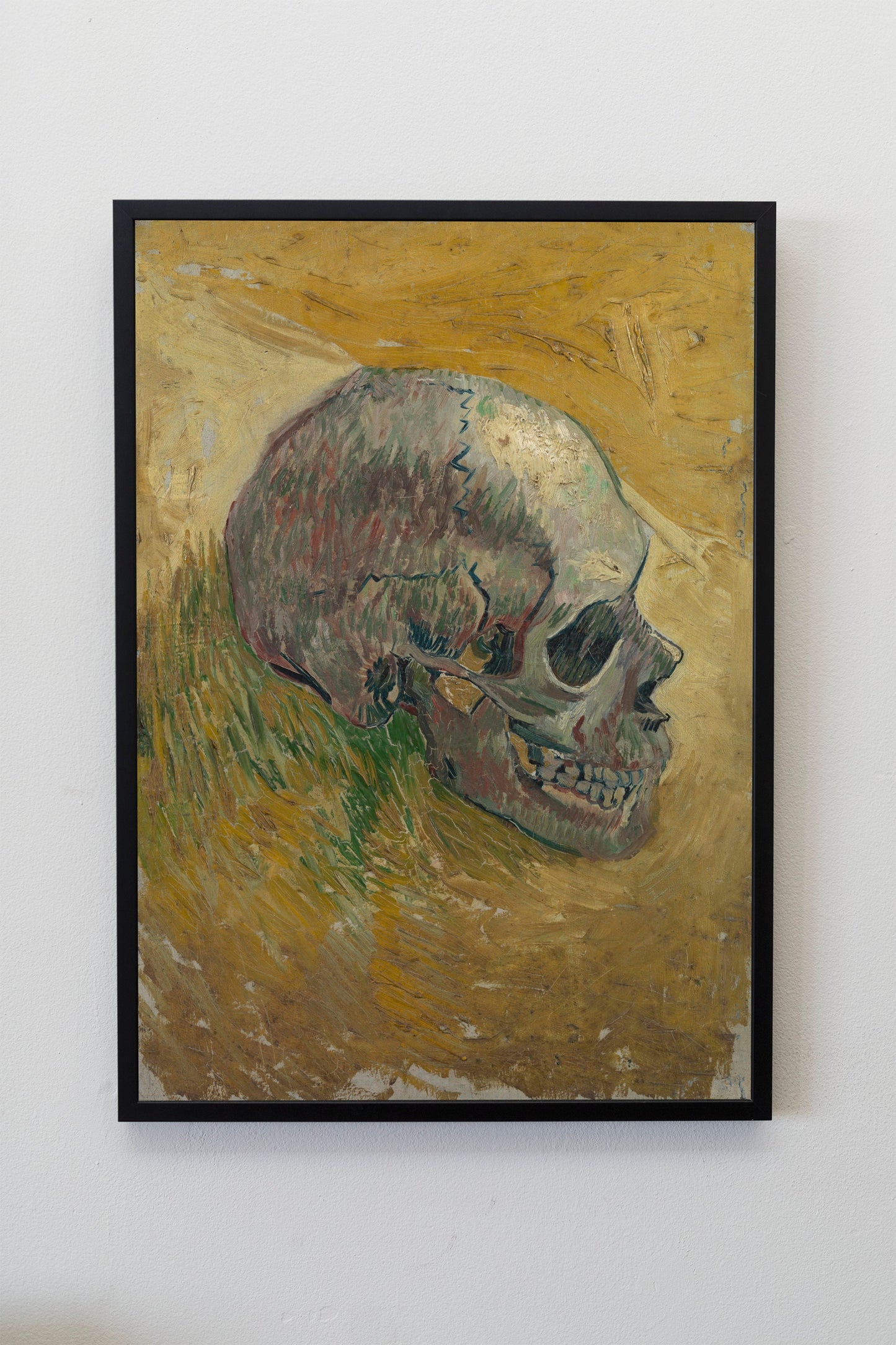 a painting of a skull on a wall