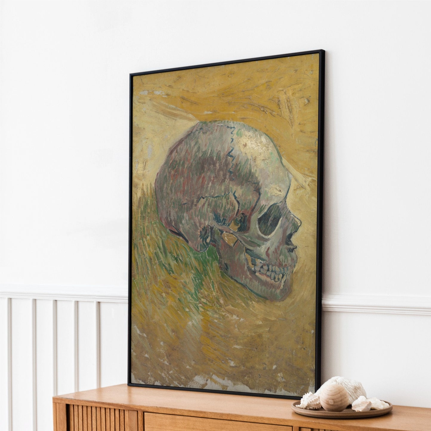 a painting of a skull sitting on top of a dresser