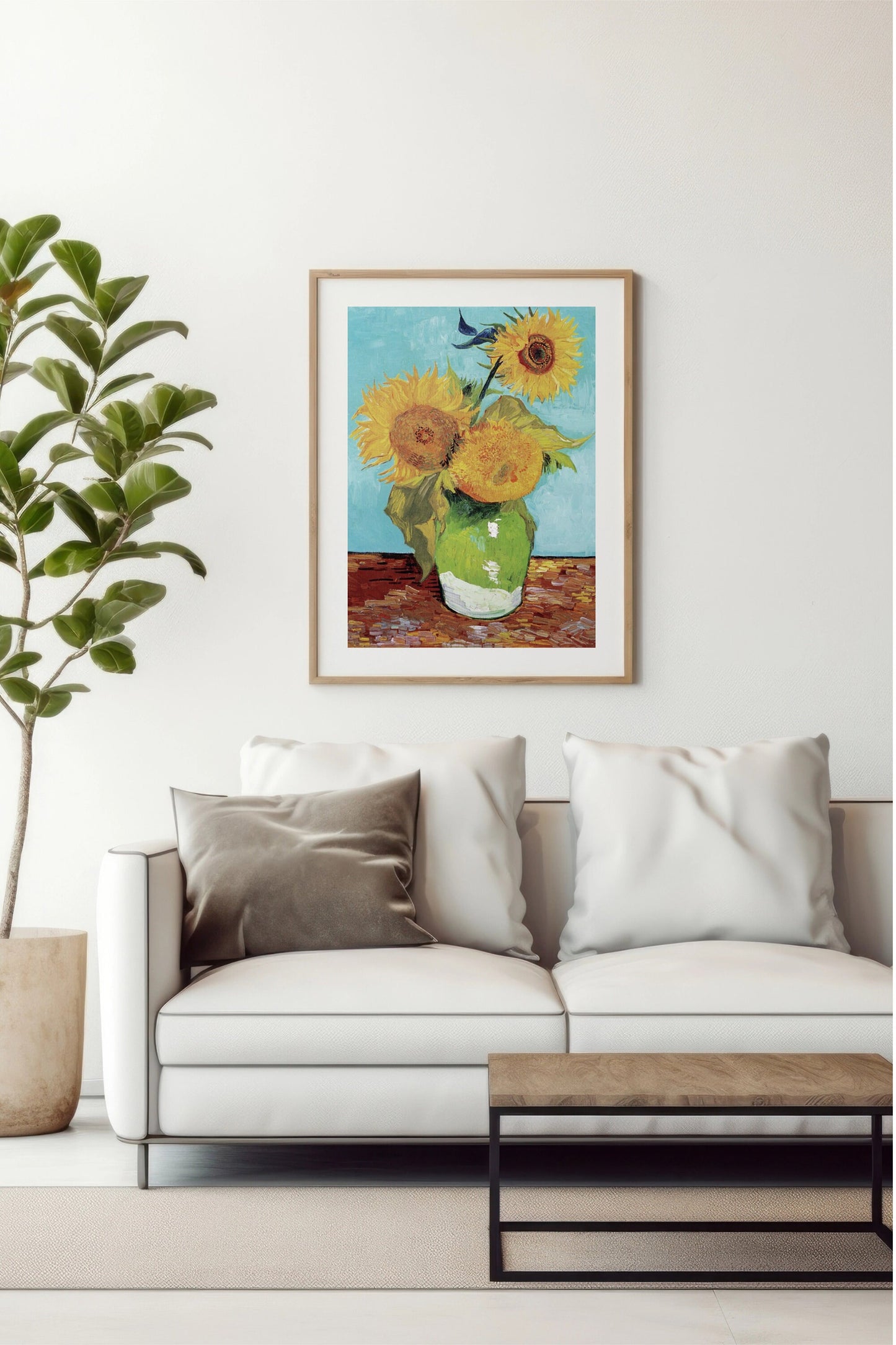 a painting of sunflowers in a vase on a white couch