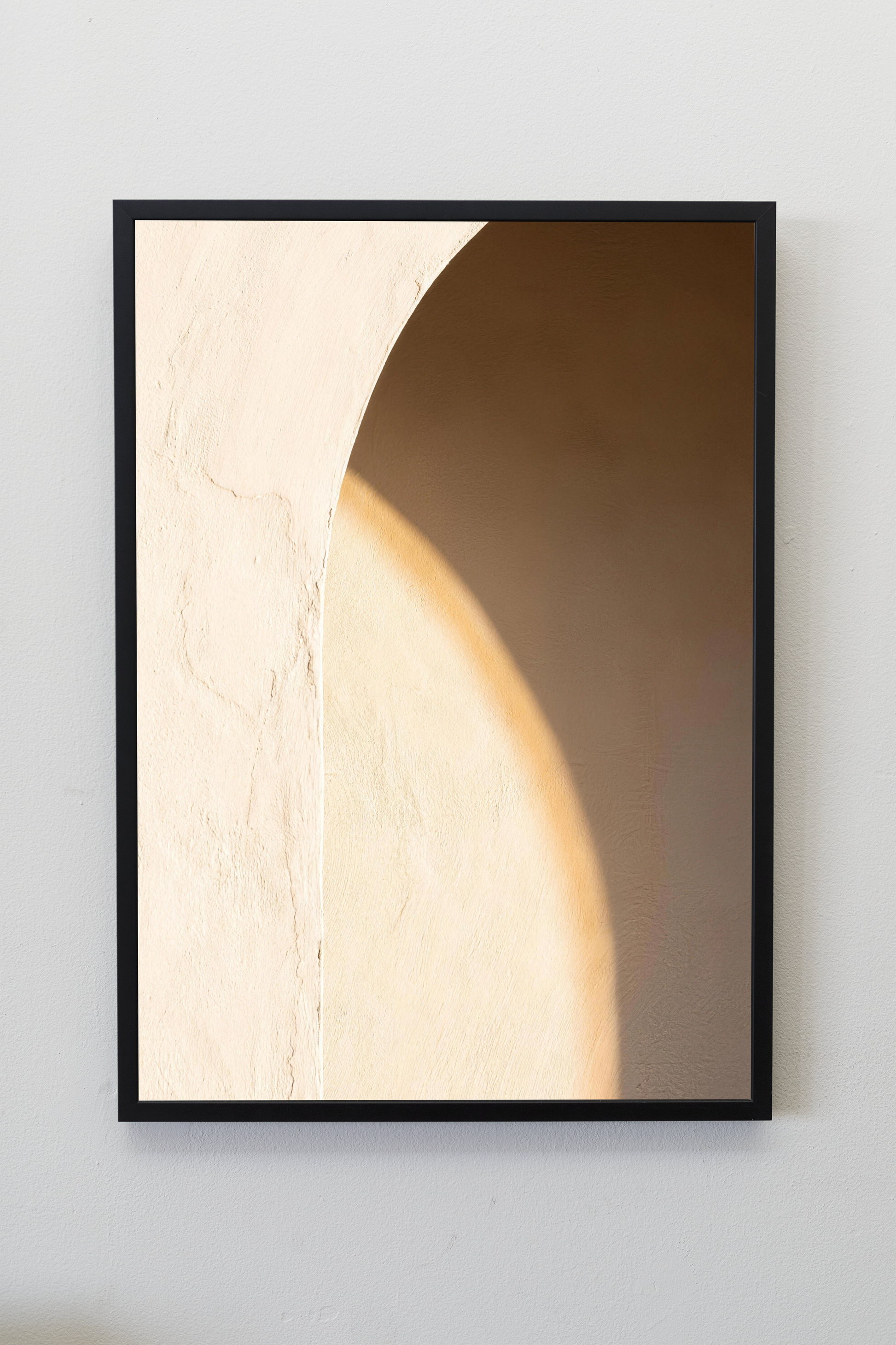 Sunlit Wall Alentejo print framed on a gallery wall