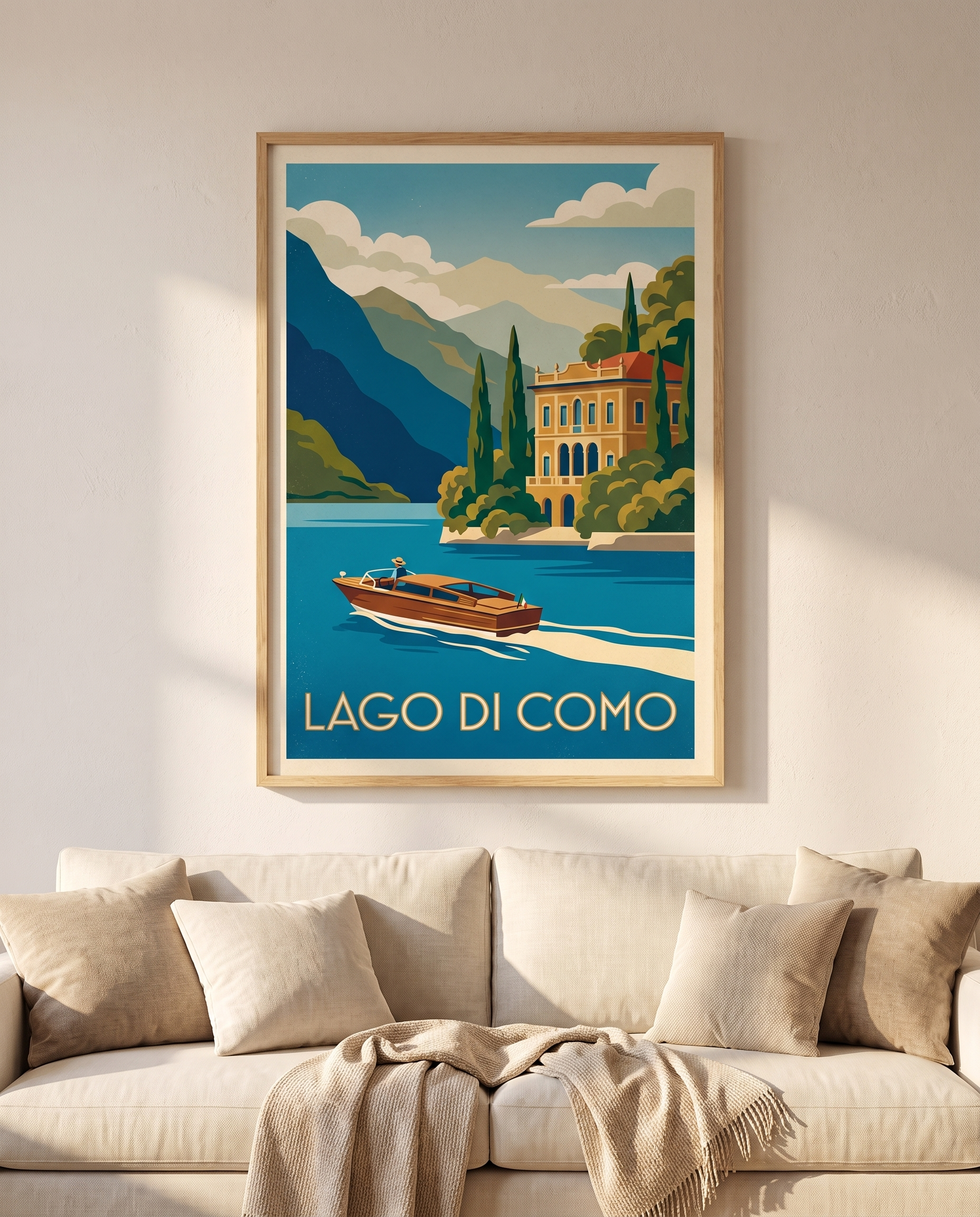 Lago di Como travel poster framed in oak above a cream linen sofa