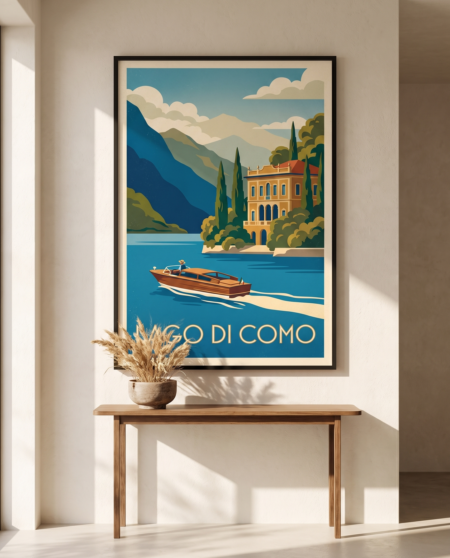 Lago di Como travel poster framed in black above a hallway console