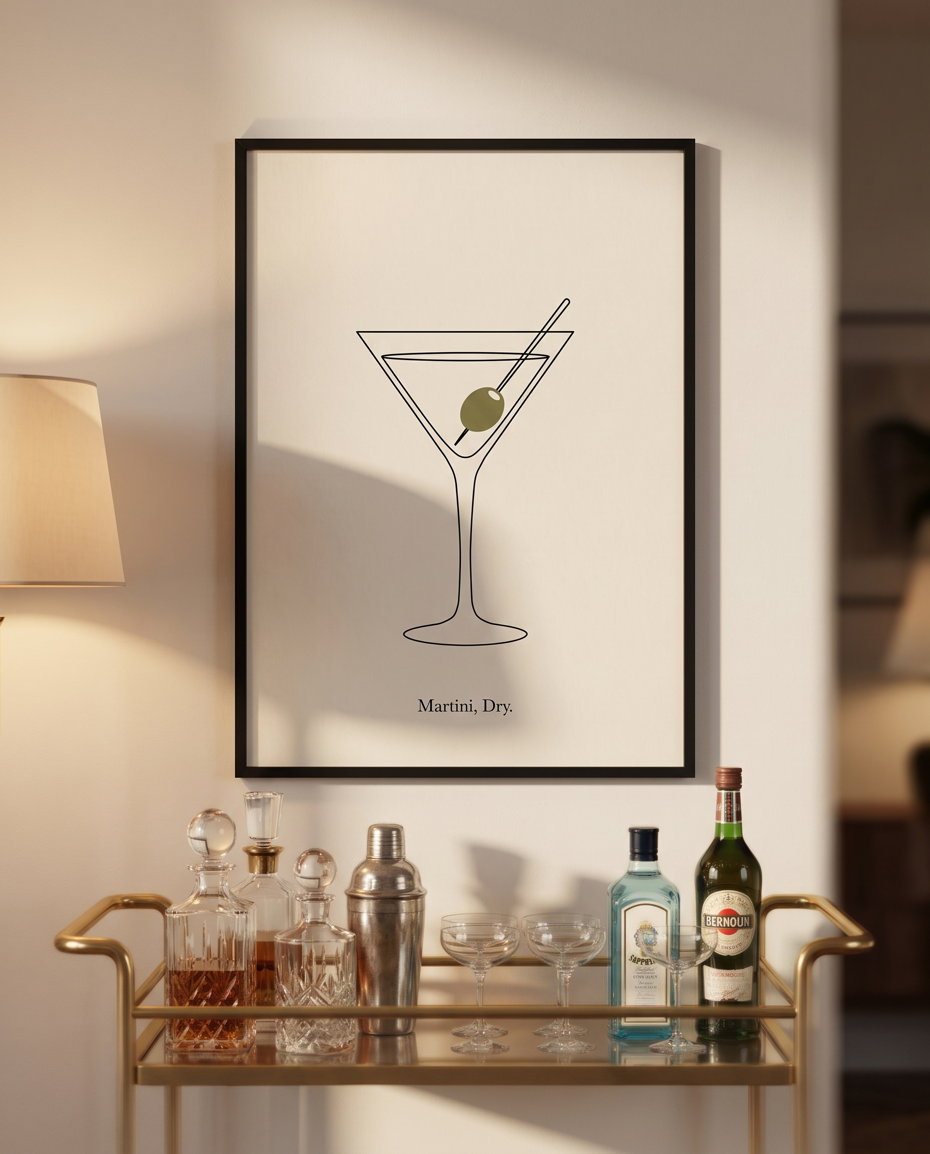 Martini Dry print framed in black above a brass bar cart