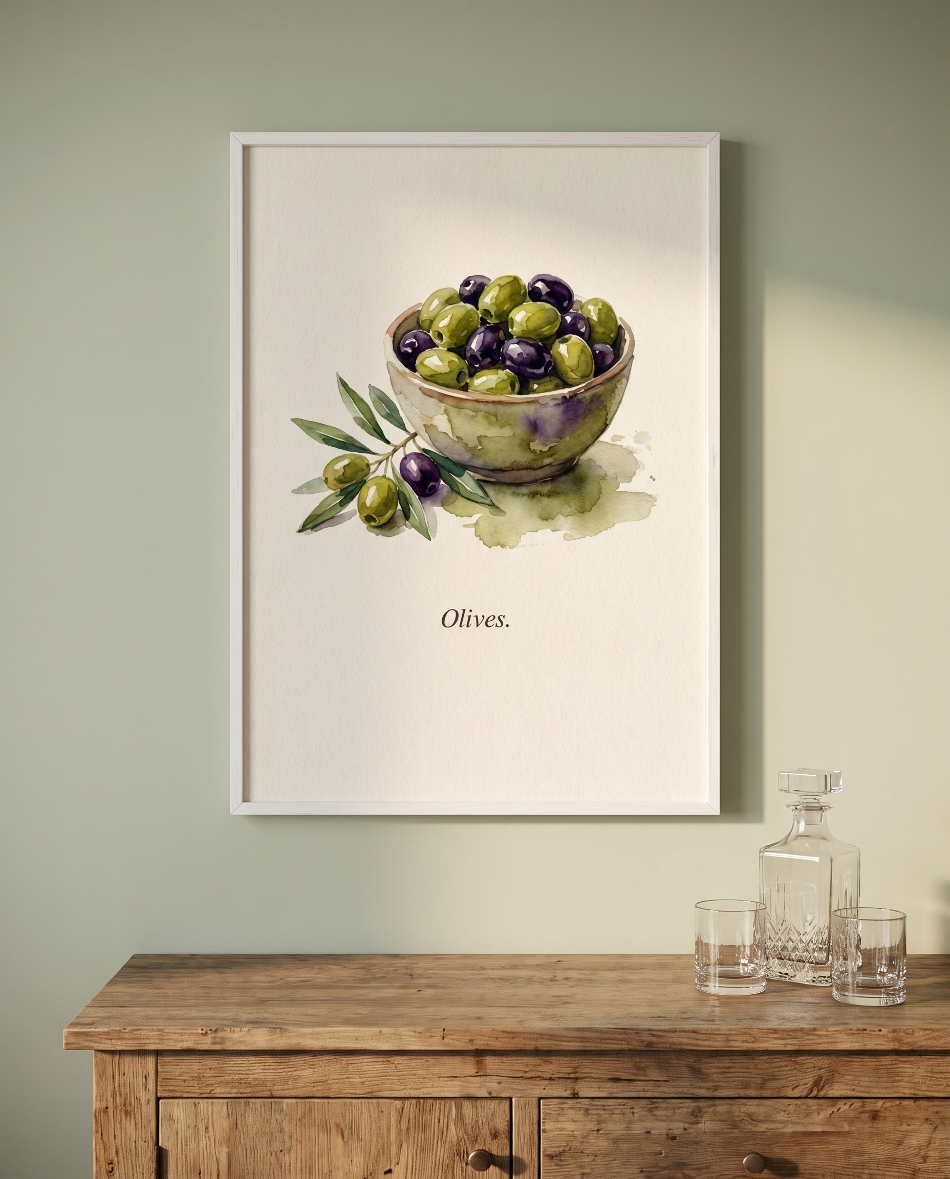 Olives kitchen print framed in white in a sage dining room