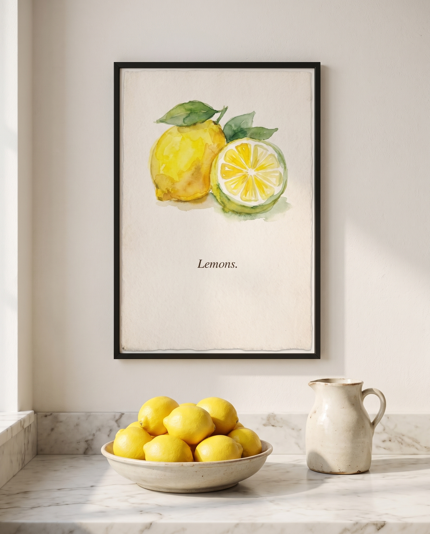 Lemons kitchen print framed in black above a marble worktop