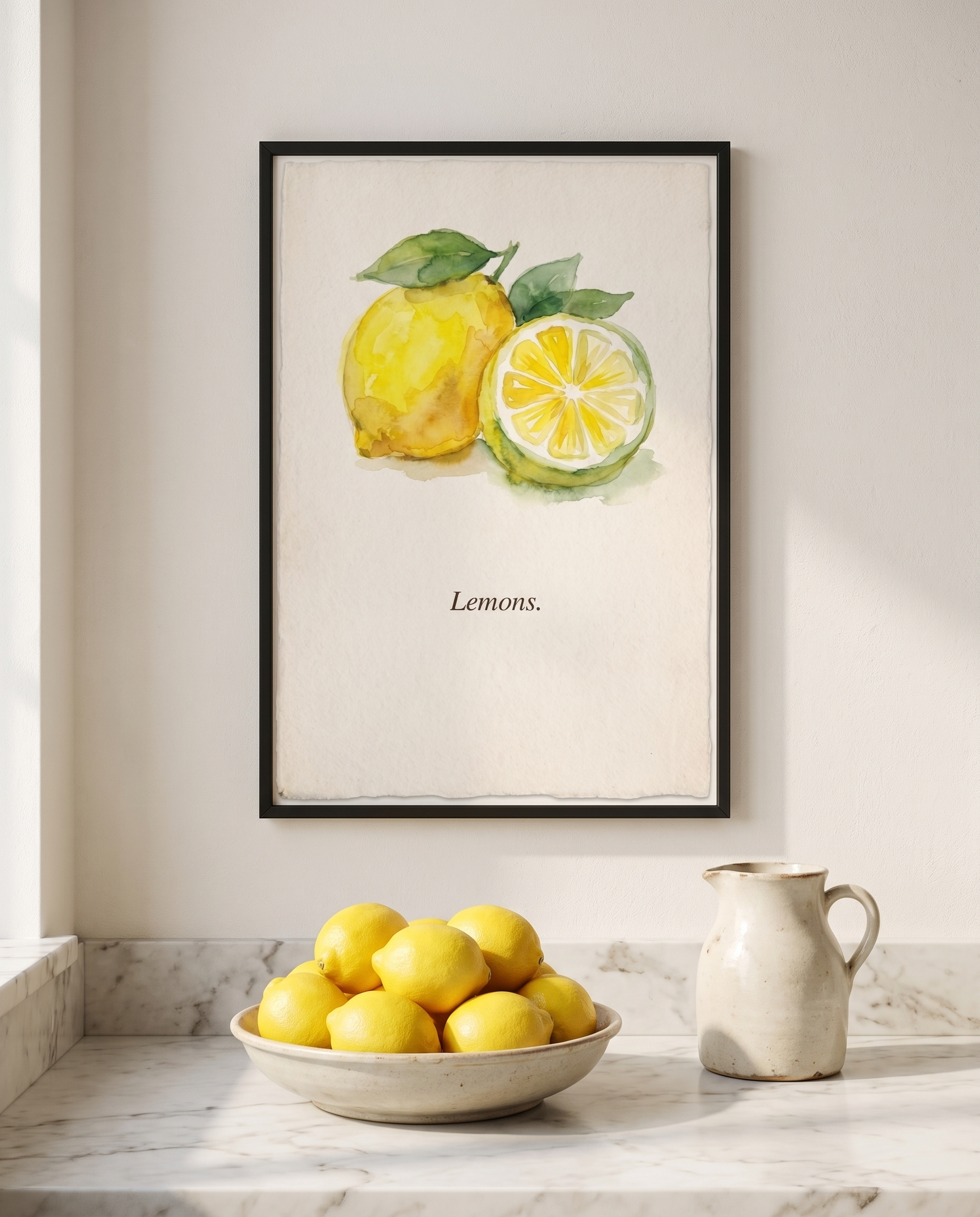 Lemons kitchen print framed in black above a marble worktop