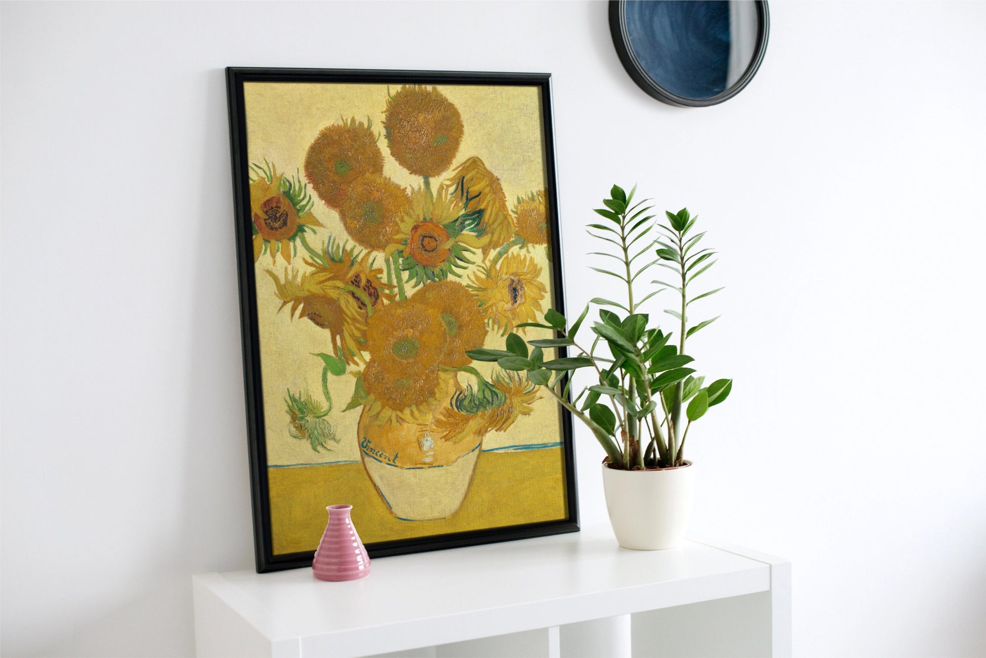 a painting of sunflowers in a vase on a shelf